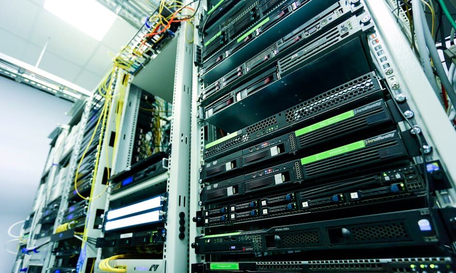 High-tech server rack in a secure data center with network cables and hardware components.